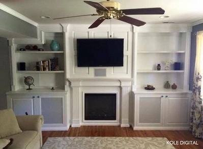 white custom cabinetry media room